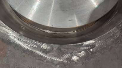 Press base with 400 kg of weld metal