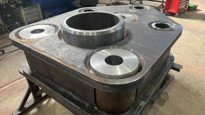 Press base with 400 kg of weld metal