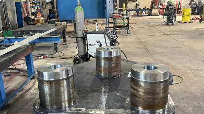 Press base with 400 kg of weld metal